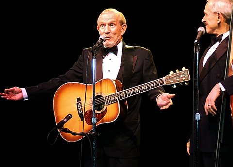 Tommy Smothers left, and his brother Dick, right, shown in a 2004 concert in Santa Rosa. 